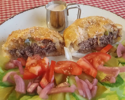 Cheeseburger Wellington Cut Open with Burger Topping Salad