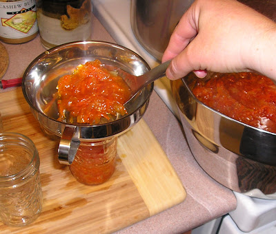 Making Marmalade - filling the jars Making Marmalade - filling the jars