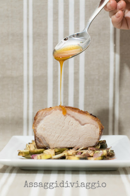 Arrosto di Cinta Senese cotto a bassa temperatura glassato all'arancia su letto di carciofi Arrosto di Cinta Senese cotto a bassa temperatura glassato all'arancia su letto di carciofi