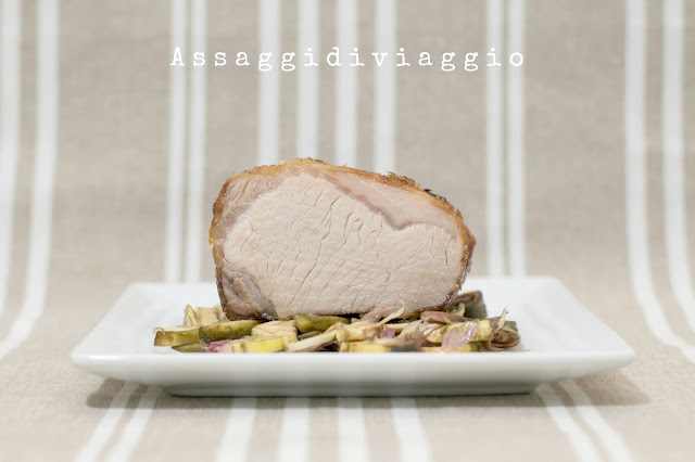 Arrosto di Cinta Senese cotto a bassa temperatura glassato all'arancia su letto di carciofi Arrosto di Cinta Senese cotto a bassa temperatura glassato all'arancia su letto di carciofi