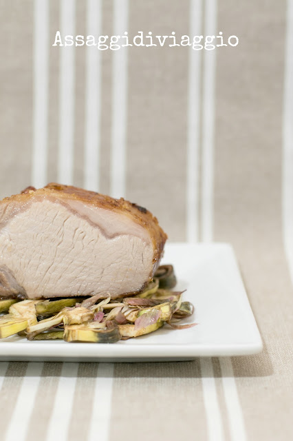 Arrosto di Cinta Senese cotto a bassa temperatura glassato all'arancia su letto di carciofi Arrosto di Cinta Senese cotto a bassa temperatura glassato all'arancia su letto di carciofi