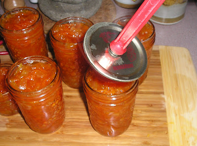 Making Marmalade - putting on the lids Making Marmalade - putting on the lids
