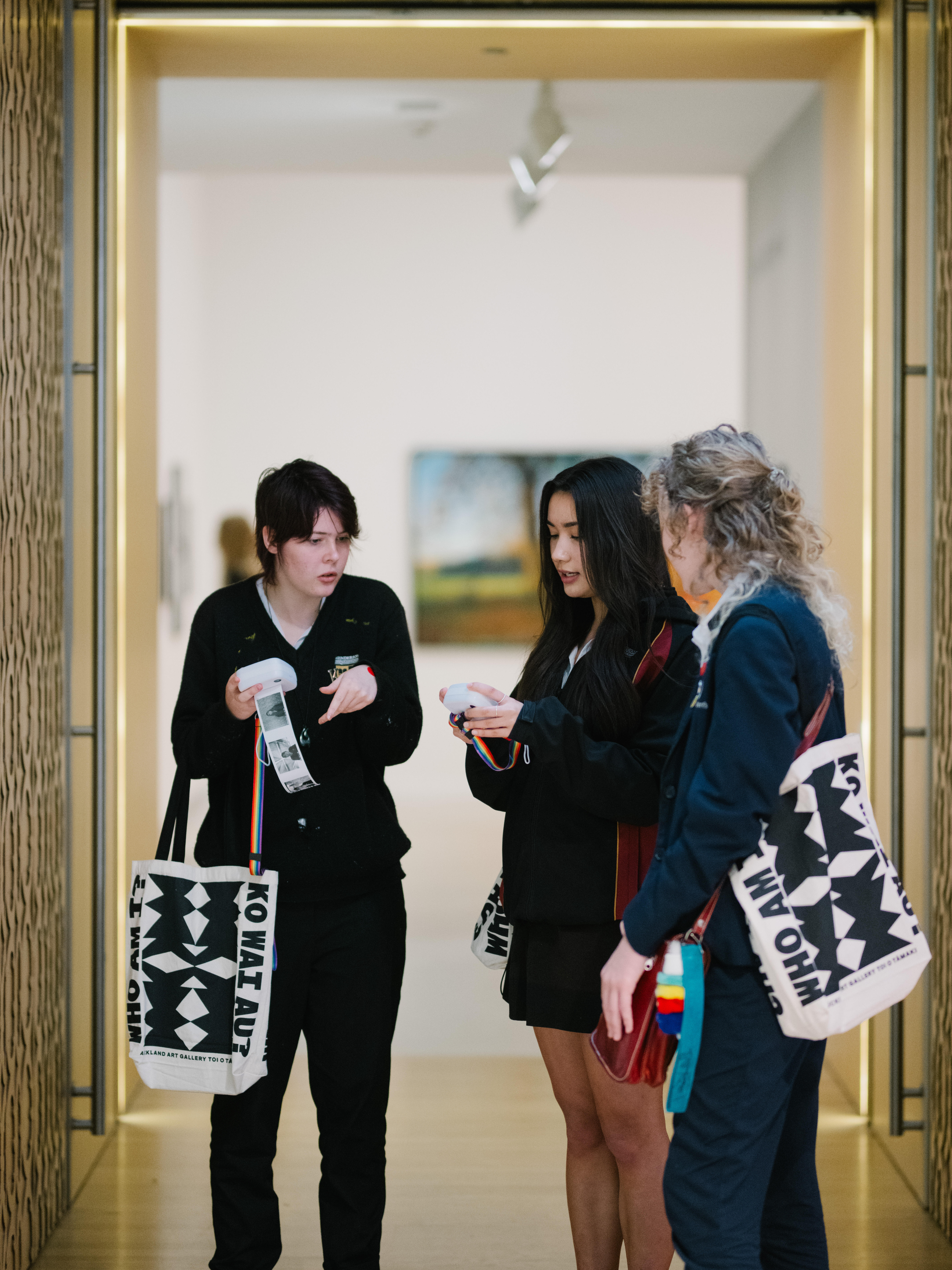 <p>Students exploring exhibitions, 2024</p>
