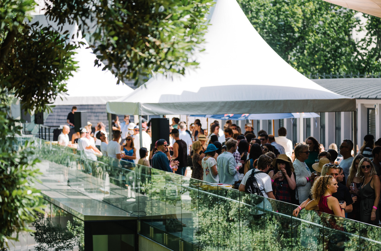 <p>Enjoying the sun of the East terrace during the summer music series, Anno Domini</p>