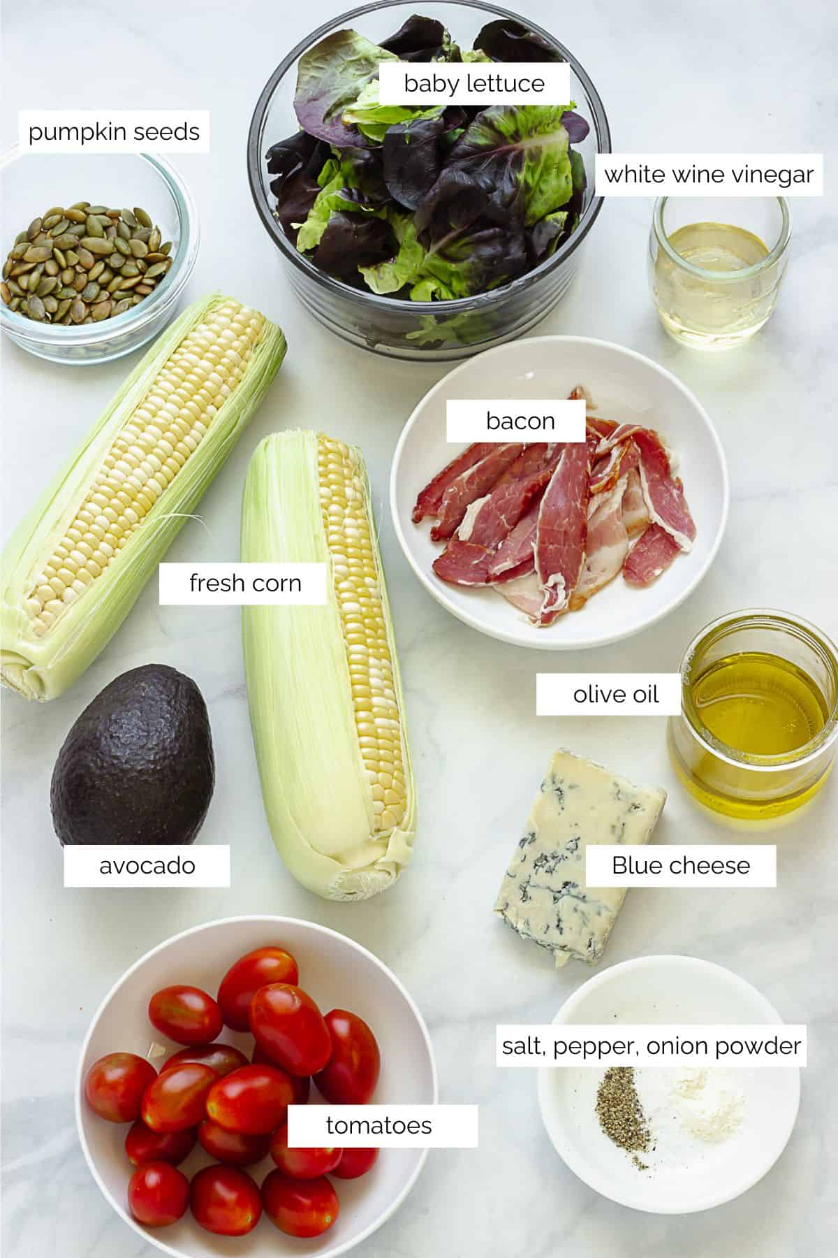 Ingredients needed to make a BLT salad.