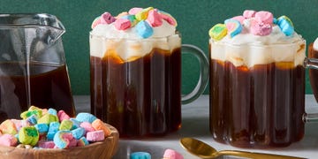coffee cocktail topped with whipped cream and lucky charms