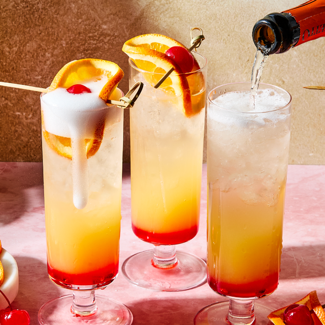 assorted colorful cocktails with garnishes and a shaker assorted colorful cocktails with garnishes and a shaker