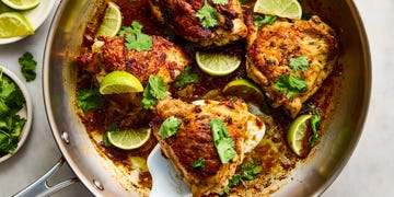 chicken thighs topped with cilantro and lime pieces