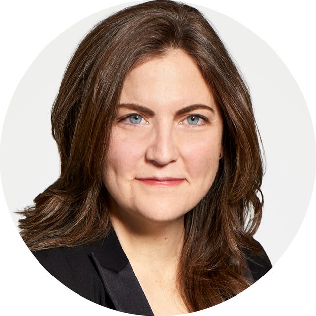 Circular portrait of a woman with blurred face, wearing a black blazer. Circular portrait of a woman with blurred face, wearing a black blazer.