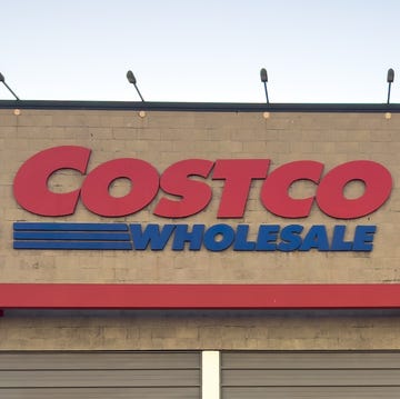 Exterior of Costco Wholesale store with entrance signage and shopping carts calgary, alberta, canada jan 22, 2026 exterior of costco wholesale store with entrance signage and shopping carts