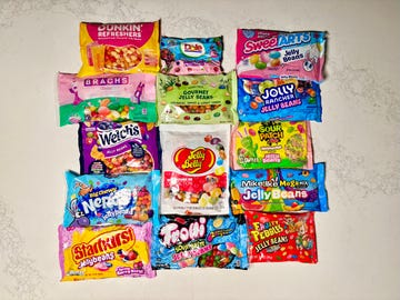 Variety of jelly bean bags arranged on a flat surface.