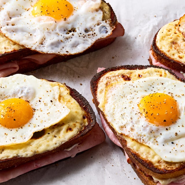 Croque Madame sandwich topped with an egg Croque Madame sandwich topped with an egg
