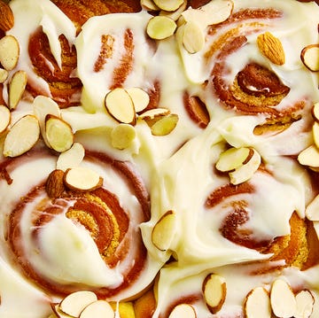 Almond Croissant Cinnamon Rolls cinnamon rolls with cream cheese icing and sliced almonds