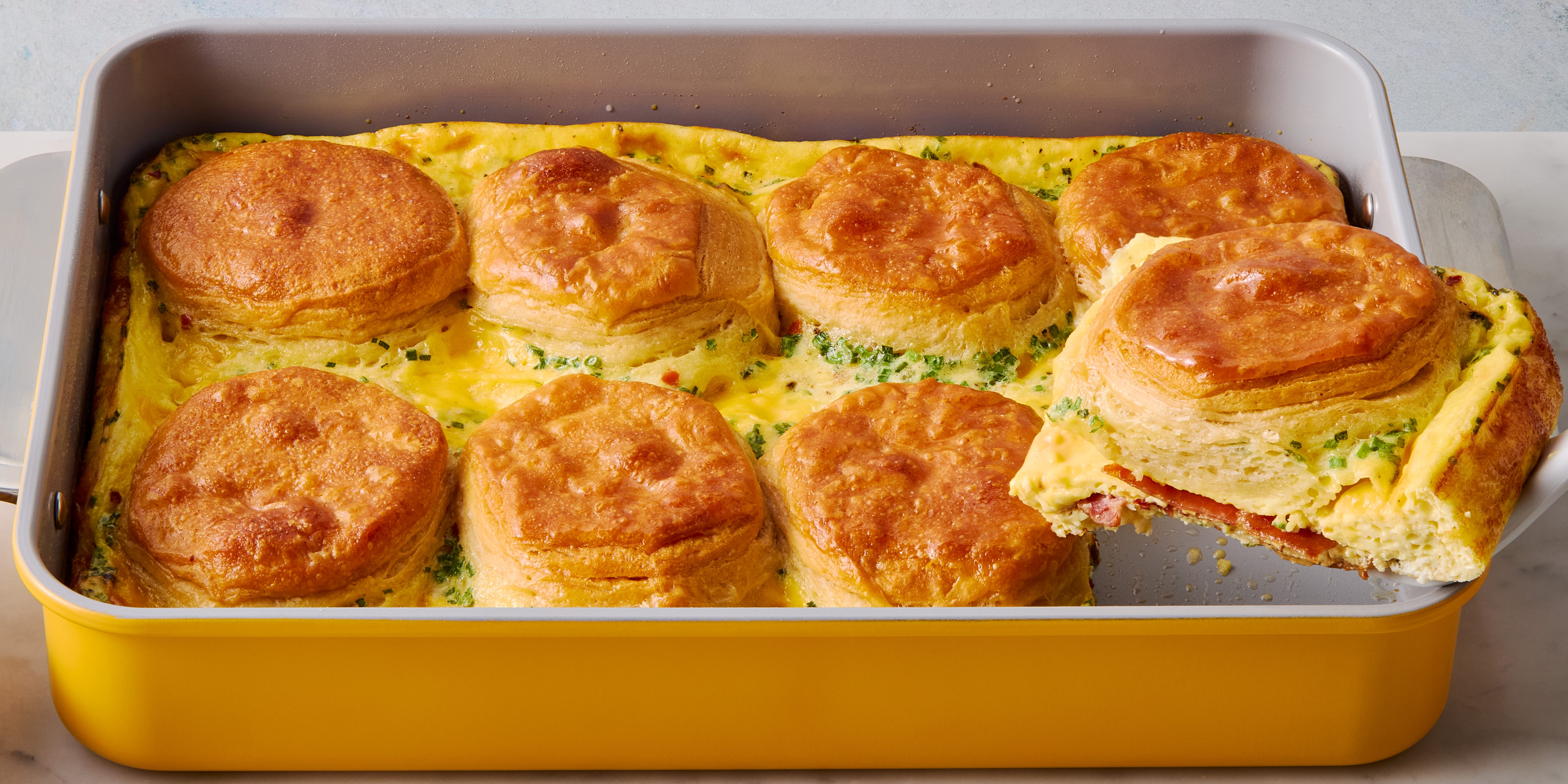 Bacon & Egg and Cheese Biscuit Casserole bacon and egg casserole layered with biscuits