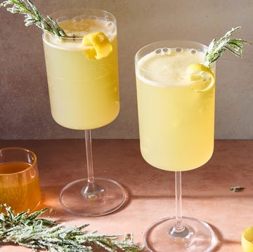 Bee's Knees Mocktail Spritz bee's knees mocktail spritz with a lemon twist and sugared rosemary