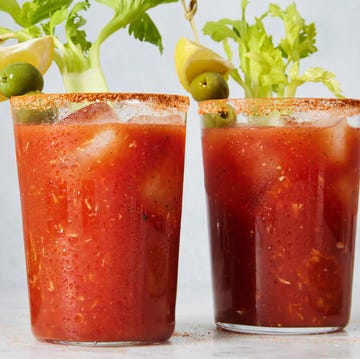 Bloody Mary bloody mary garnished with lemon, celery, and olives