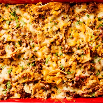 Cheesy Taco Bake ground beef and cheese baked over chips in a casserole dish