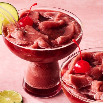 Cherry Coke Margarita Slushies frozen cherry coke margaritas with a lime wheel and popsicles