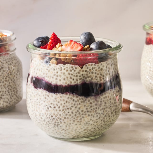 Chia Pudding chia pudding with berries, granola, and jam