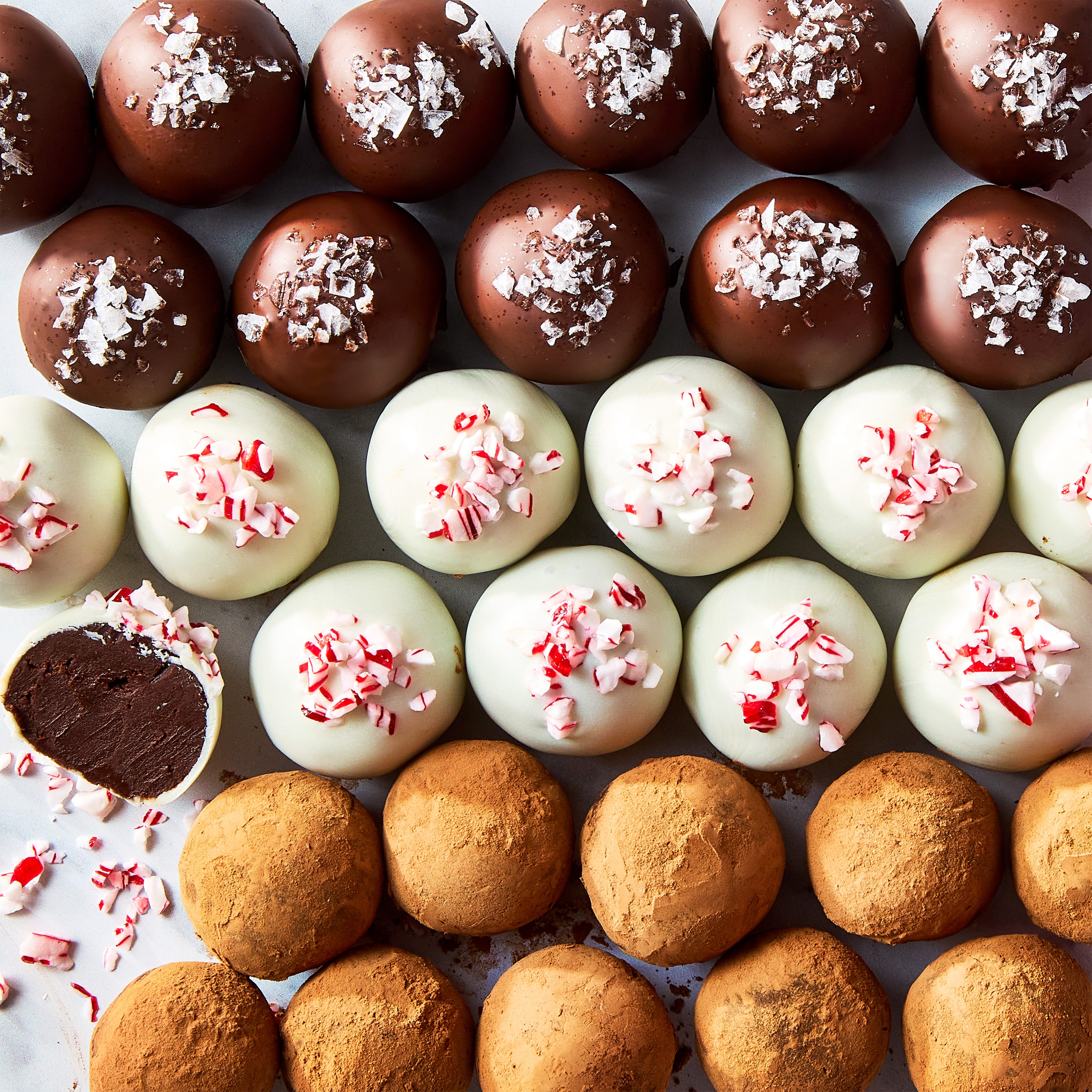 Chocolate Truffles chocolate truffles topped with candy canes, sea salt, and cocoa powder