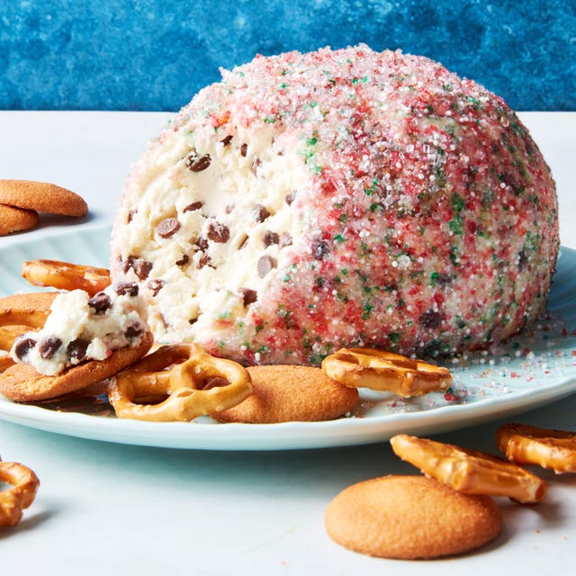 chocolate chip cookie dough ball rolled in sprinkles served with pretzels and nilla wafers