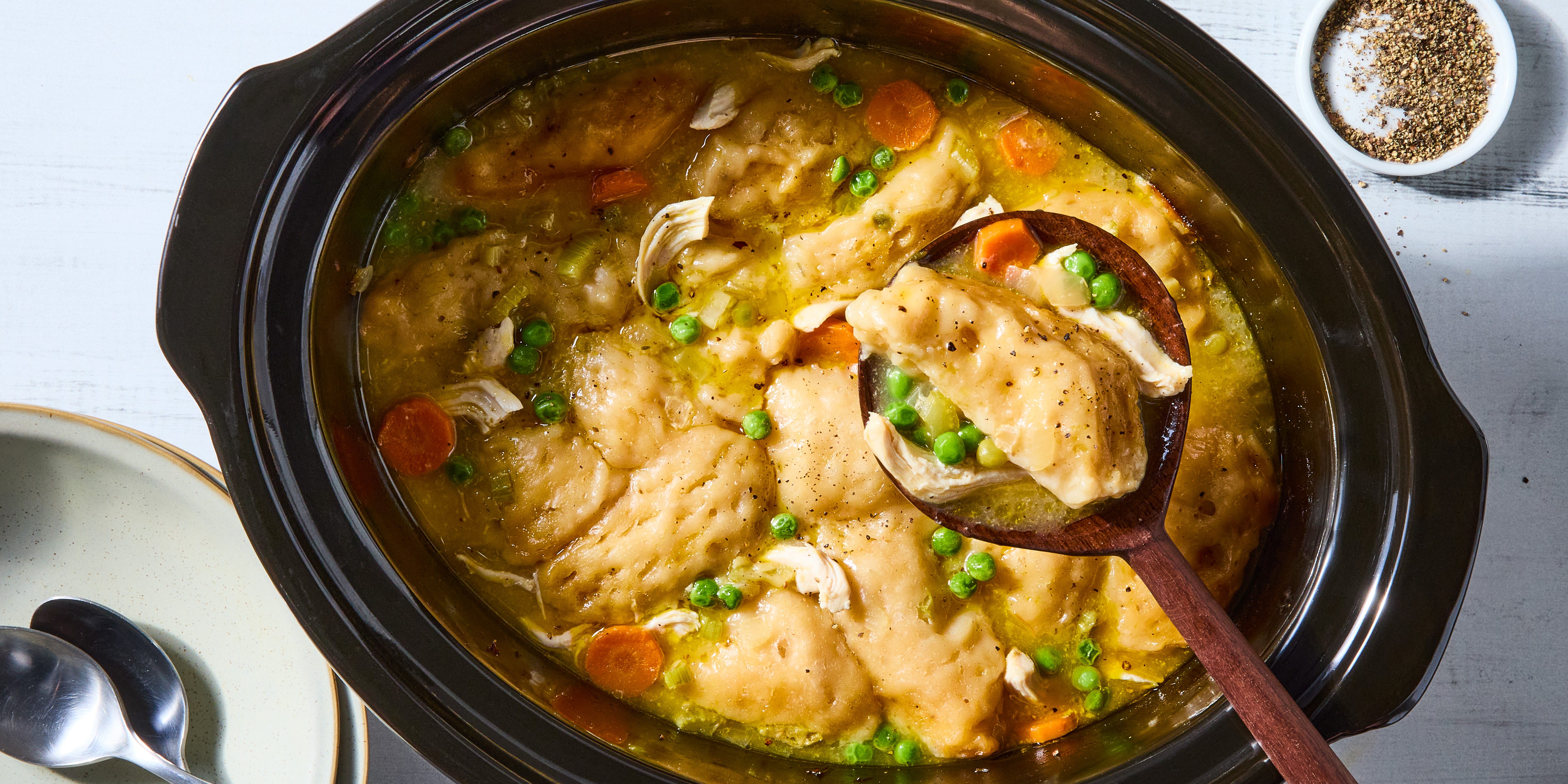 Crock-Pot Chicken & Dumplings chicken and dumplings with veggies in a crock pot