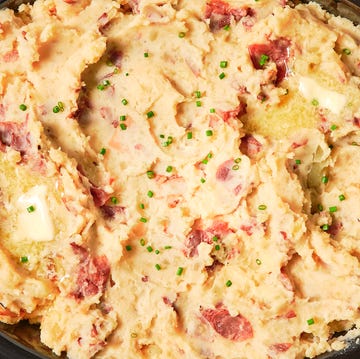 Crockpot Garlicky Mashed Potatoes mashed potatoes in a crockpot with garlic and butter