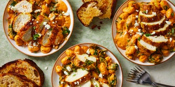 Creamy Harissa Chicken & Gnocchi pillowy gnocchi in a creamy harissa sauce with ras al hanout spiced chicken, sliced mushrooms, spinach, and crumbled feta