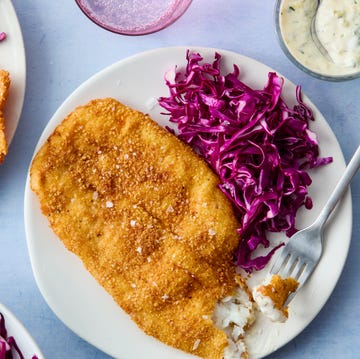 Matzo fried fish matzo fried fish on plates with red cabbage slaw