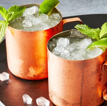 Moscow Mule chilled vodka blended with lime juice, mint, and ginger beer, served in a frosty copper mug