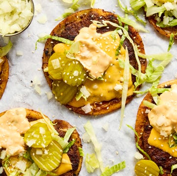 Smash Burger Tacos the ultimate comfort food hybrid with a crispy, juicy, thin beef patty, melty american cheese, and all the classic burger fixings loaded onto a toasted flour tortilla