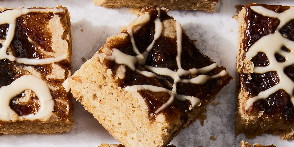 Dirty Chai Blondies chewy brown sugar blondies with a spiced caramel swirl and creamy espresso chai glaze