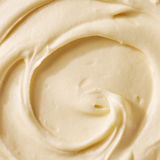 cream cheese frosting close up of cream cheese frosting
