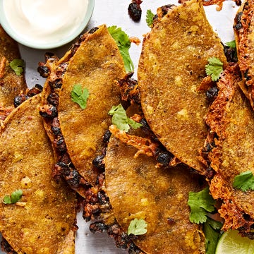 Crispy sheet pan black bean tacos crispy sheet pan black bean tacos on a sheet pan with a bowl of sour cream