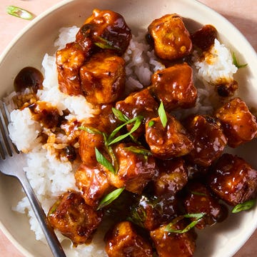 Chili crisp fried tofu chili crisp fried tofu on rice in a bowl topped with scallions
