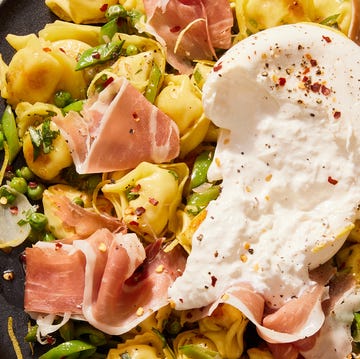 Burrata, Pea & Prosciutto Tortellini butter toasted cheese tortellini with snap peas, spring peas, prosciutto, creamy burrata, lemon, and red pepper flakes
