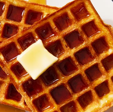 Classic Homemade Waffles square classic waffles topped with butter and drizzled with maple syrup