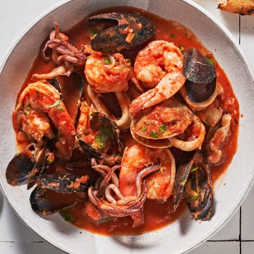 Zuppa Di Pesce zuppa di pesce with mussels clams shrimp squid tomato white wine andgarlic