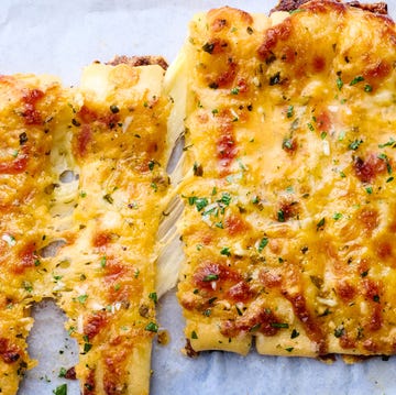 Copycat Domino’s Stuffed Cheesy Bread stuffed cheesy bread cut into breadsticks