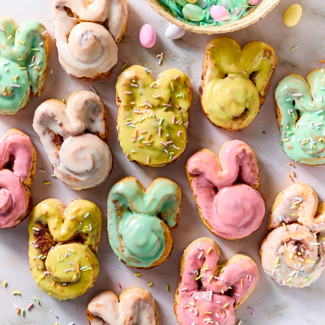 Easter Bunny Cinnamon Rolls cinnamon rolls shaped like a bunny iced with colored icing and topped with sprinkles