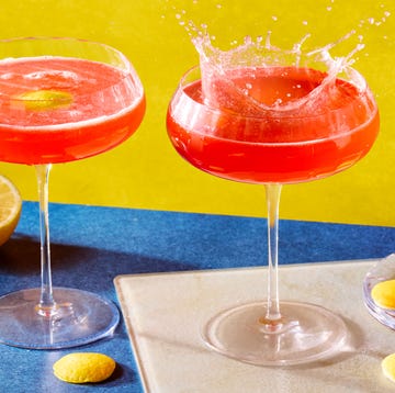 Electric Cosmo cosmopolitan with a lemon garnish