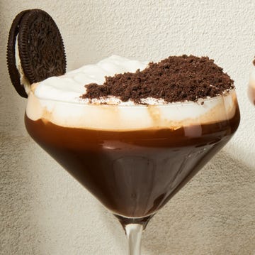 Espresso Mocha Crunch Mocktail espresso mocha crunch mocktail in a martini glass with a whipped cream and chocolate topping and oreo garnish