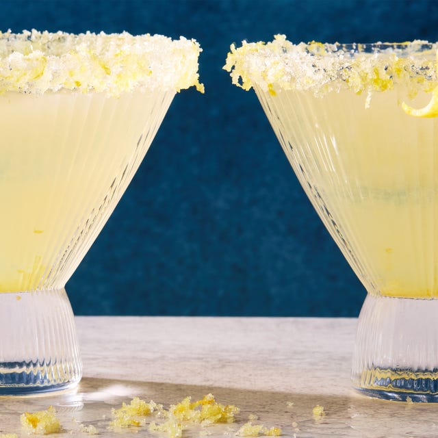 Two cocktails with lemon garnish and sugared rims. Two cocktails with lemon garnish and sugared rims.