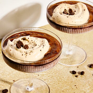 Frozen Espresso Martini frozen espresso martini with foam and coffee beans on top