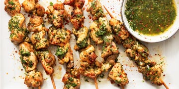 chicken skewers in a garlic herby sauce