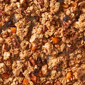 Granola granola with oats pecans walnuts apricots coconut flakes raisins maple syrup olive oil and brown sugar