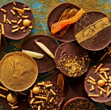 Hanukkah Gelt chocolate coins with various toppings of nuts and dried fruit