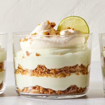 Key Lime Pie Mousse layered key lime pie mousse with whipped cream and a lime