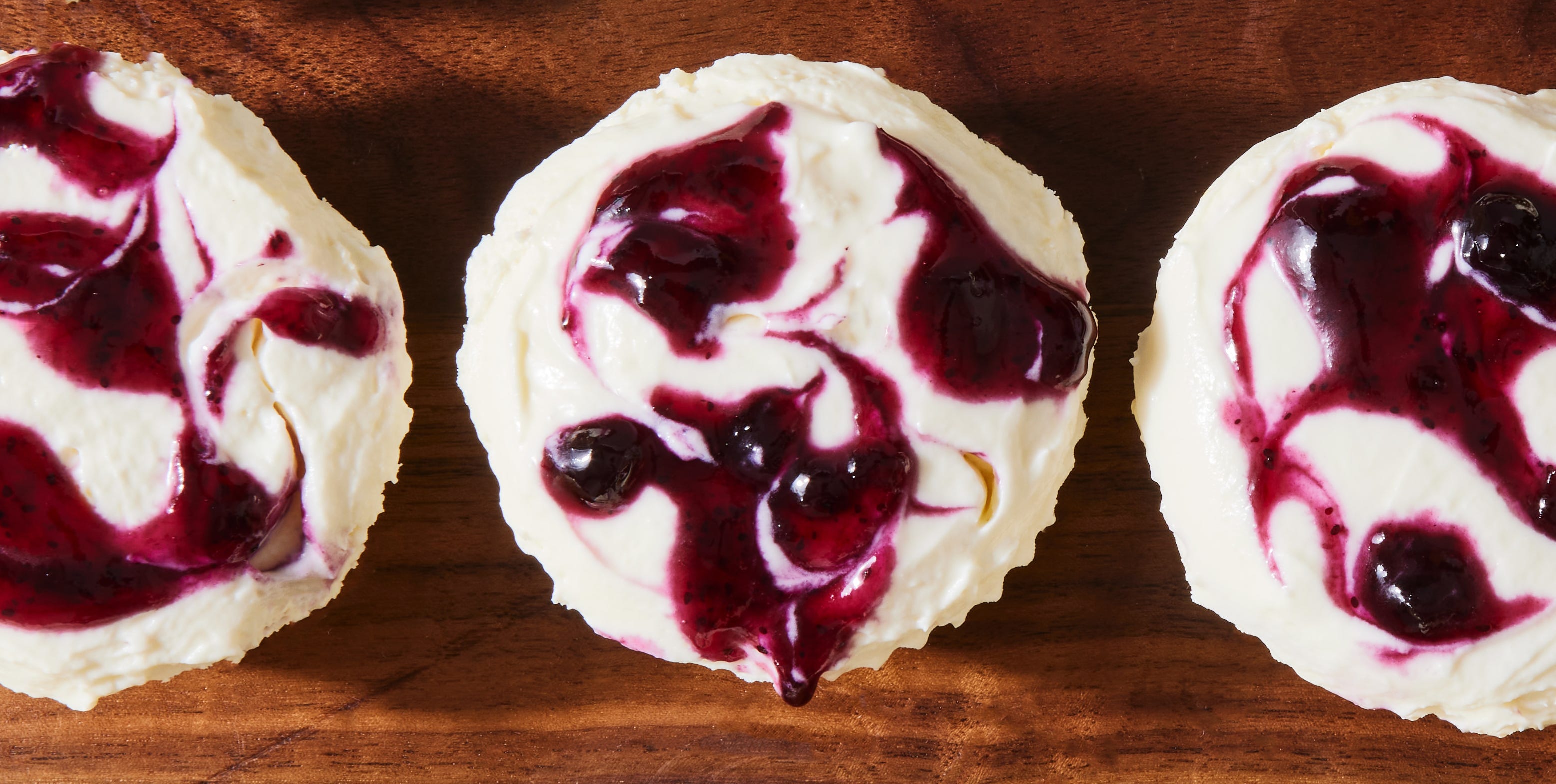 Lemon Blueberry Cheesecake Cupcakes lemon blueberry mini cheesecake cupcakes with blueberry sauce