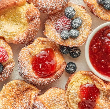 Mini Dutch Baby Pancakes mini dutch baby pancakes with berries jam and confectioners sugar